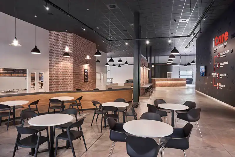 ATD cafeteria with circular tables and booth seating