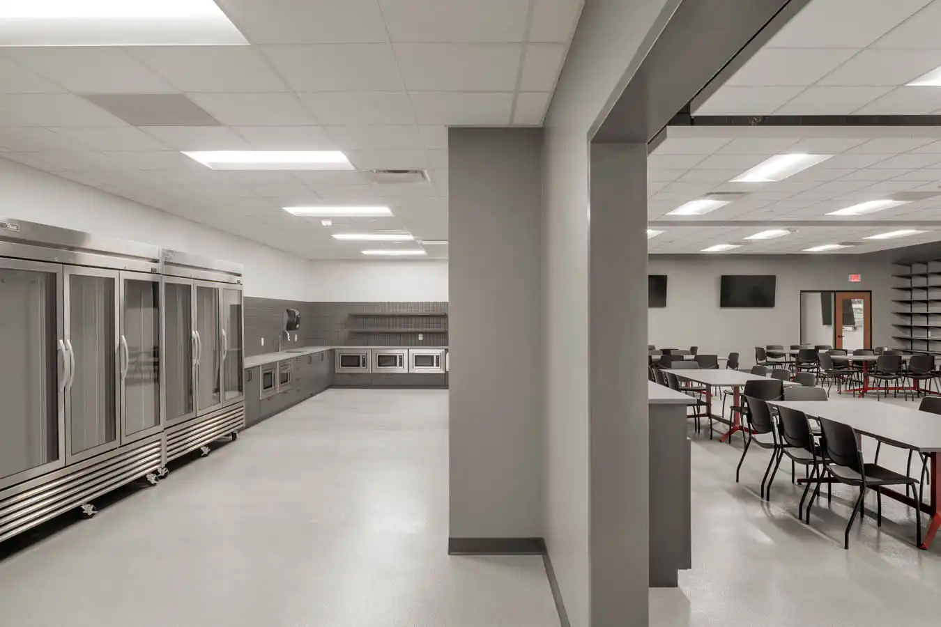 Charlotte Pipe Oakboro Foundry kitchen and seating separated by a wall