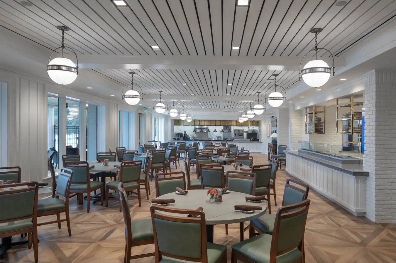 A country club cafeteria with circular table seating